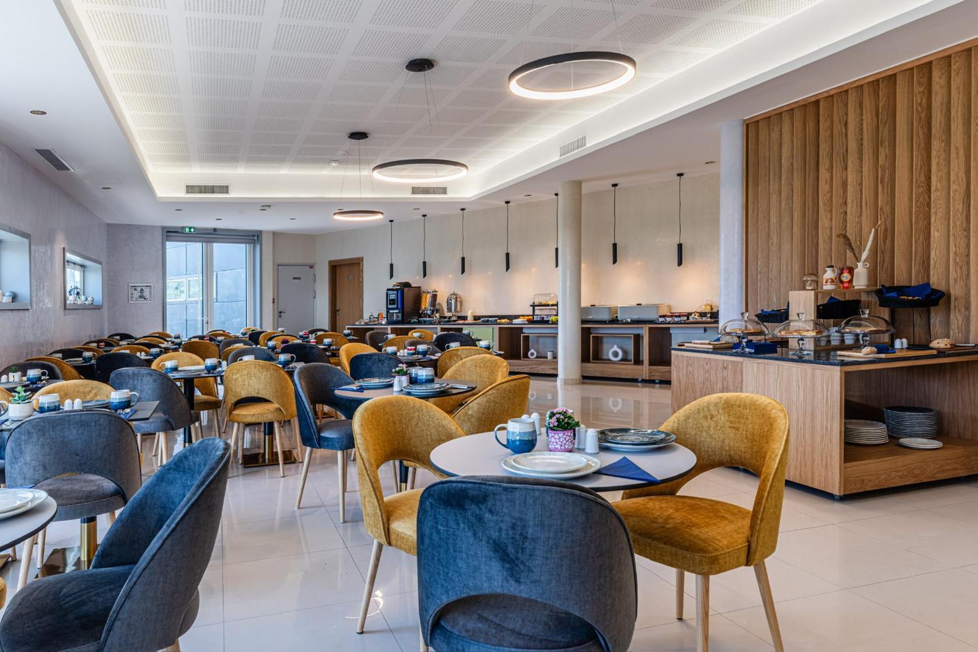 Brit Hotel Privilege Paris רוסני-סו-בואה מראה חיצוני תמונה